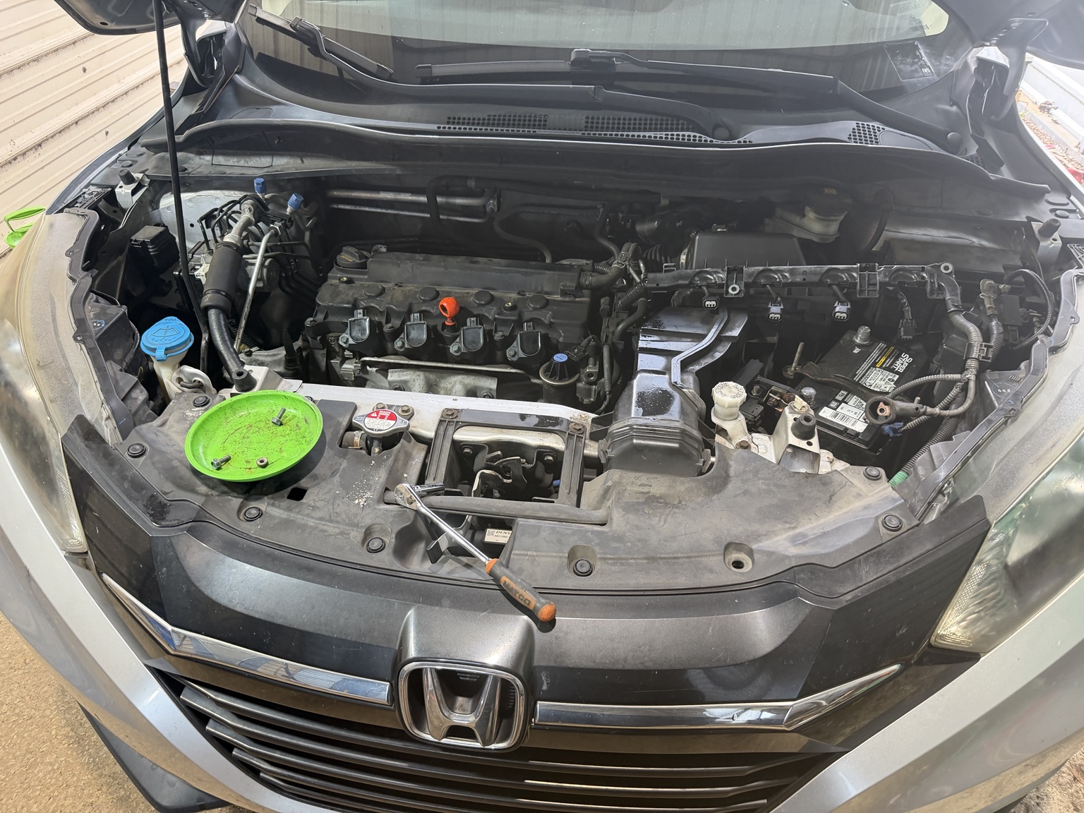 Automotive engine repair in progress